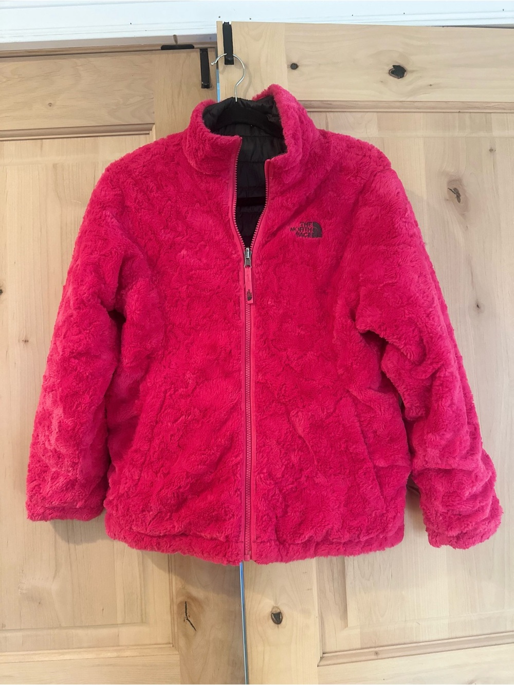 The North Face Girl’s Hot Pink/Black Faux Fur Reversible Puffer Jacket